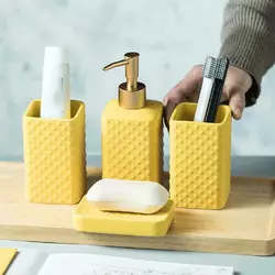 Комплект керамических аксессуаров для ванны: дозатор, мыльница, стаканы желтого цвета